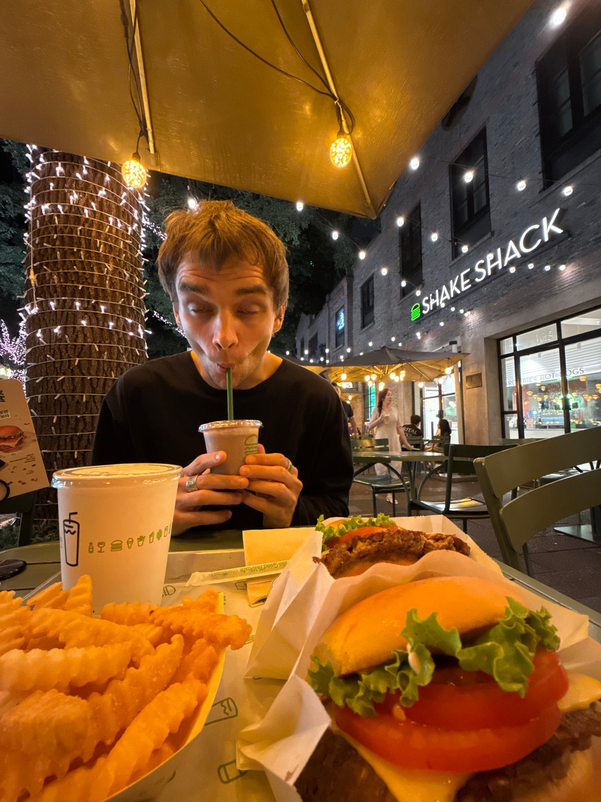 Diners document meal at Shake Shack Shanghai location