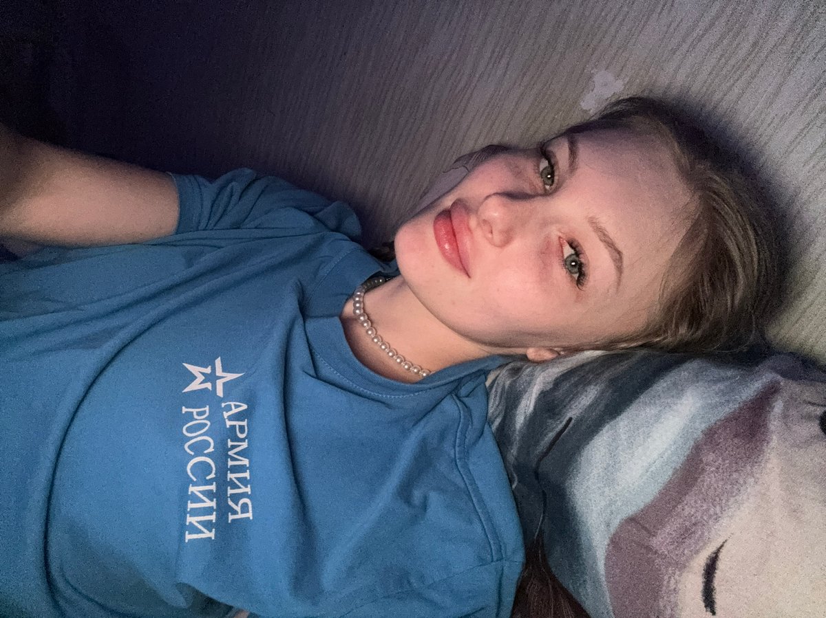 Woman documents evening selfie session in Kondratovo, Russia