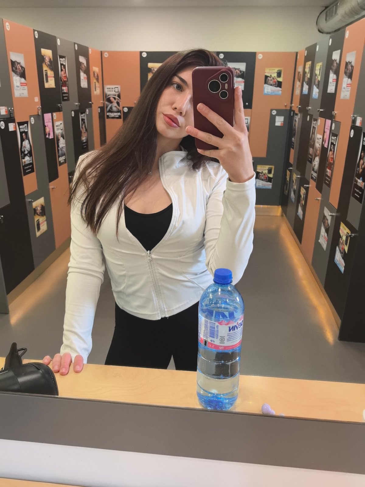 Woman Takes Mirror Selfie in Stara Zagora Locker Room