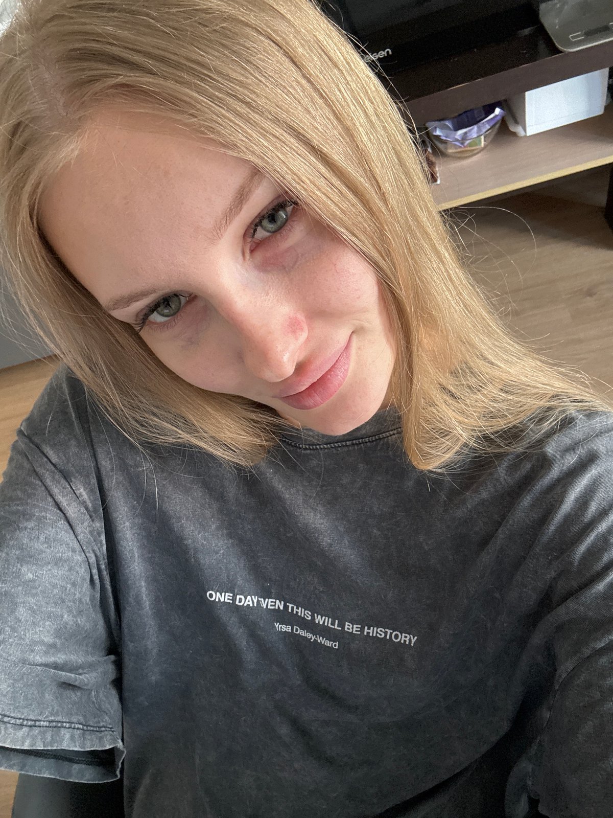 Woman takes selfies in Perm wearing literary t-shirt