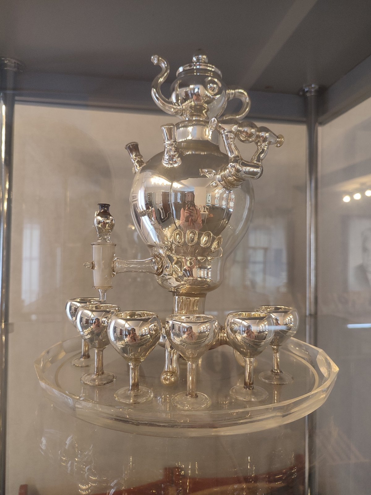 Museum visitor documents Russian cultural exhibits and architecture in Sarapul