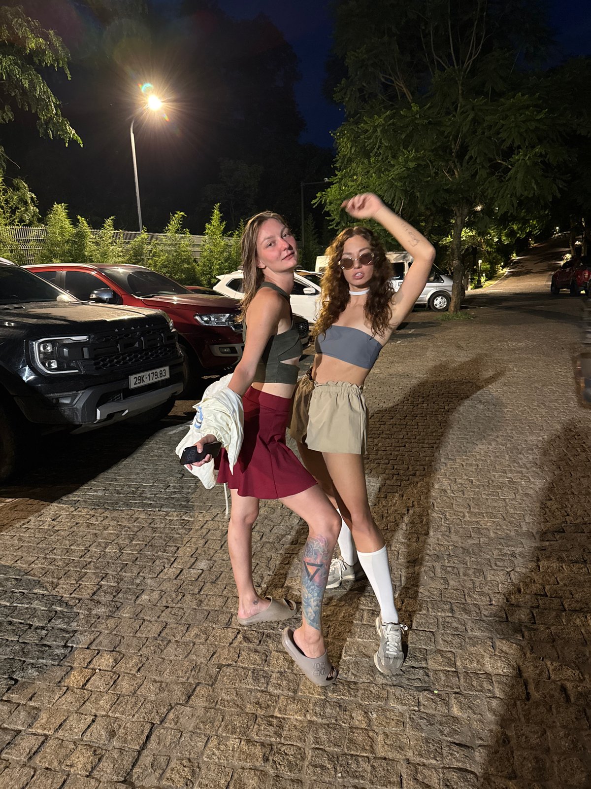 Two women document nighttime travels through northern Vietnam resorts