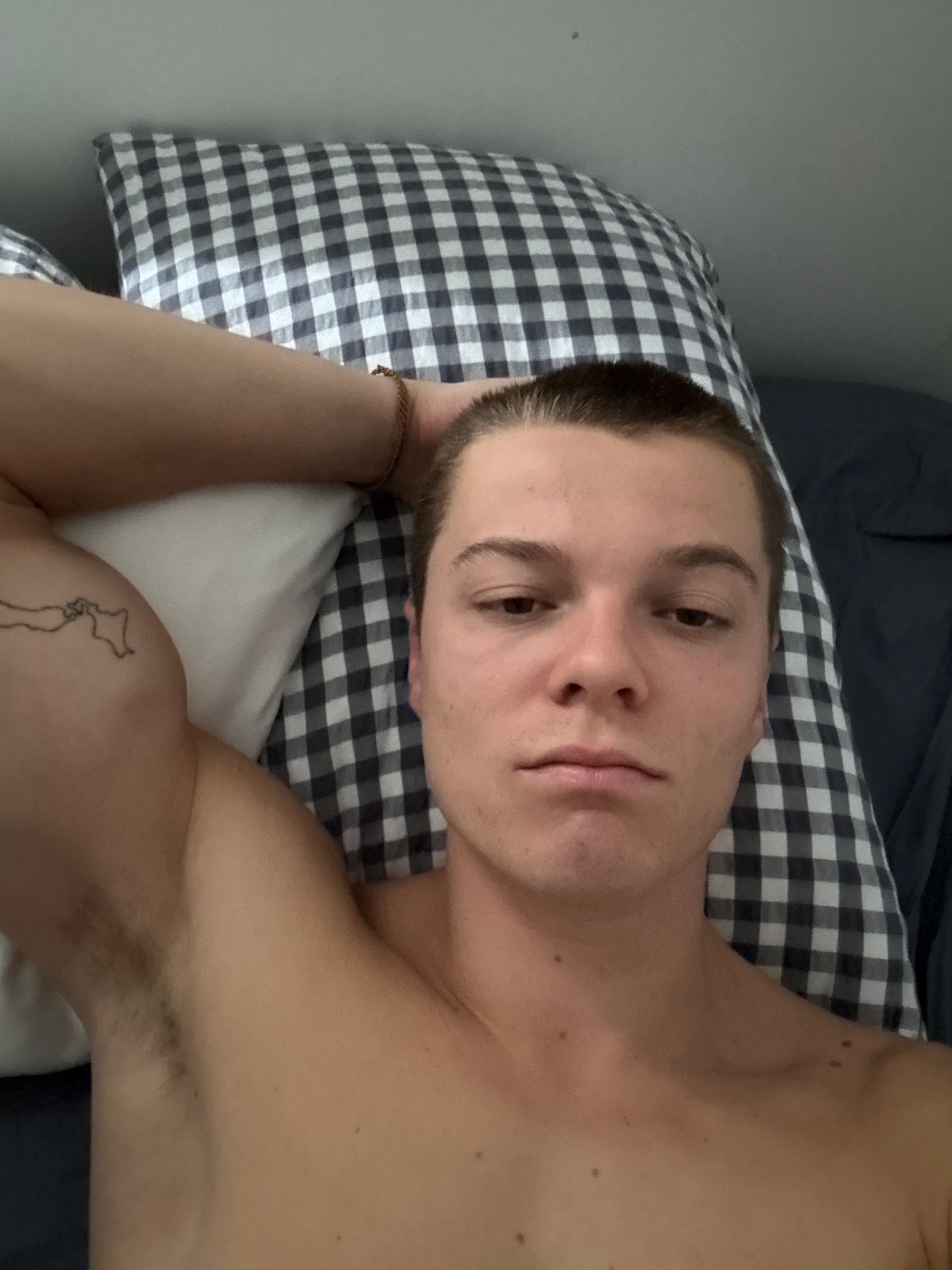 Man resting in bed observed in London morning