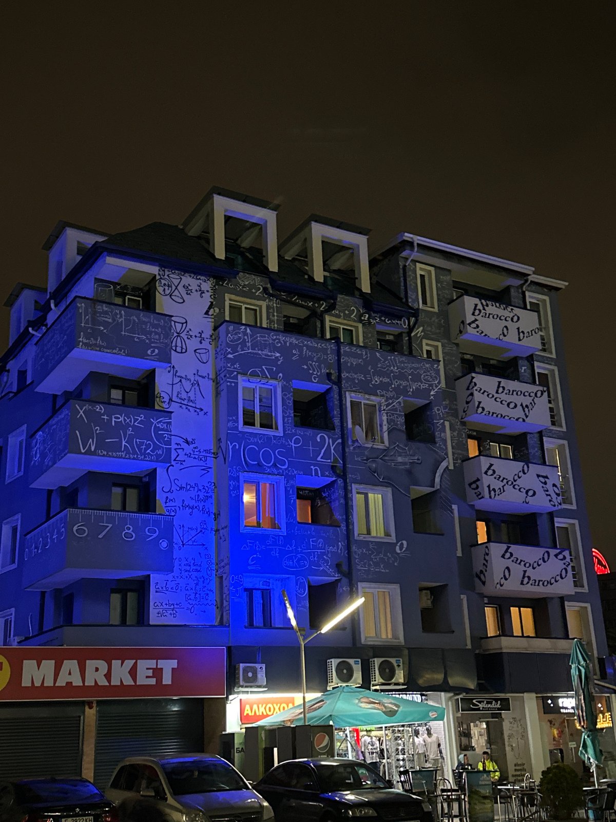 Evening scenes captured around Sofia including decorated building and bar