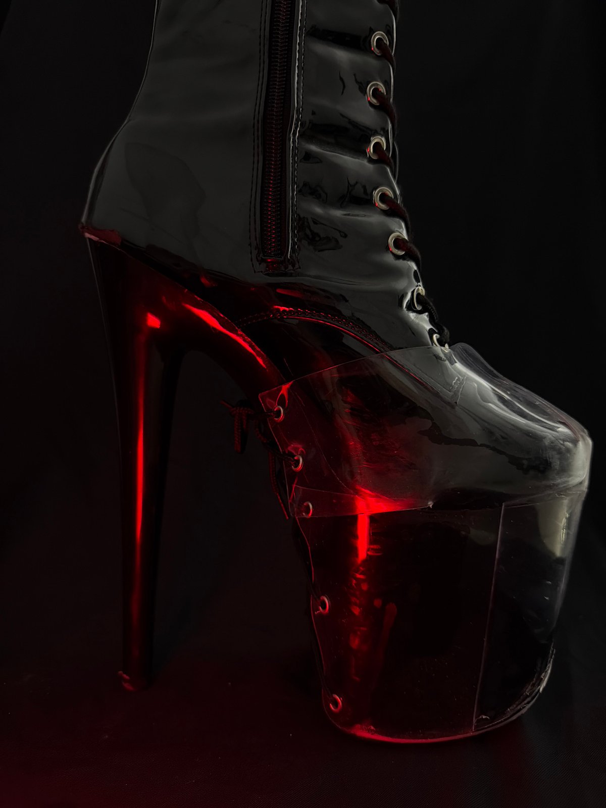 Gothic photo shoot features red boots, candles, hearts