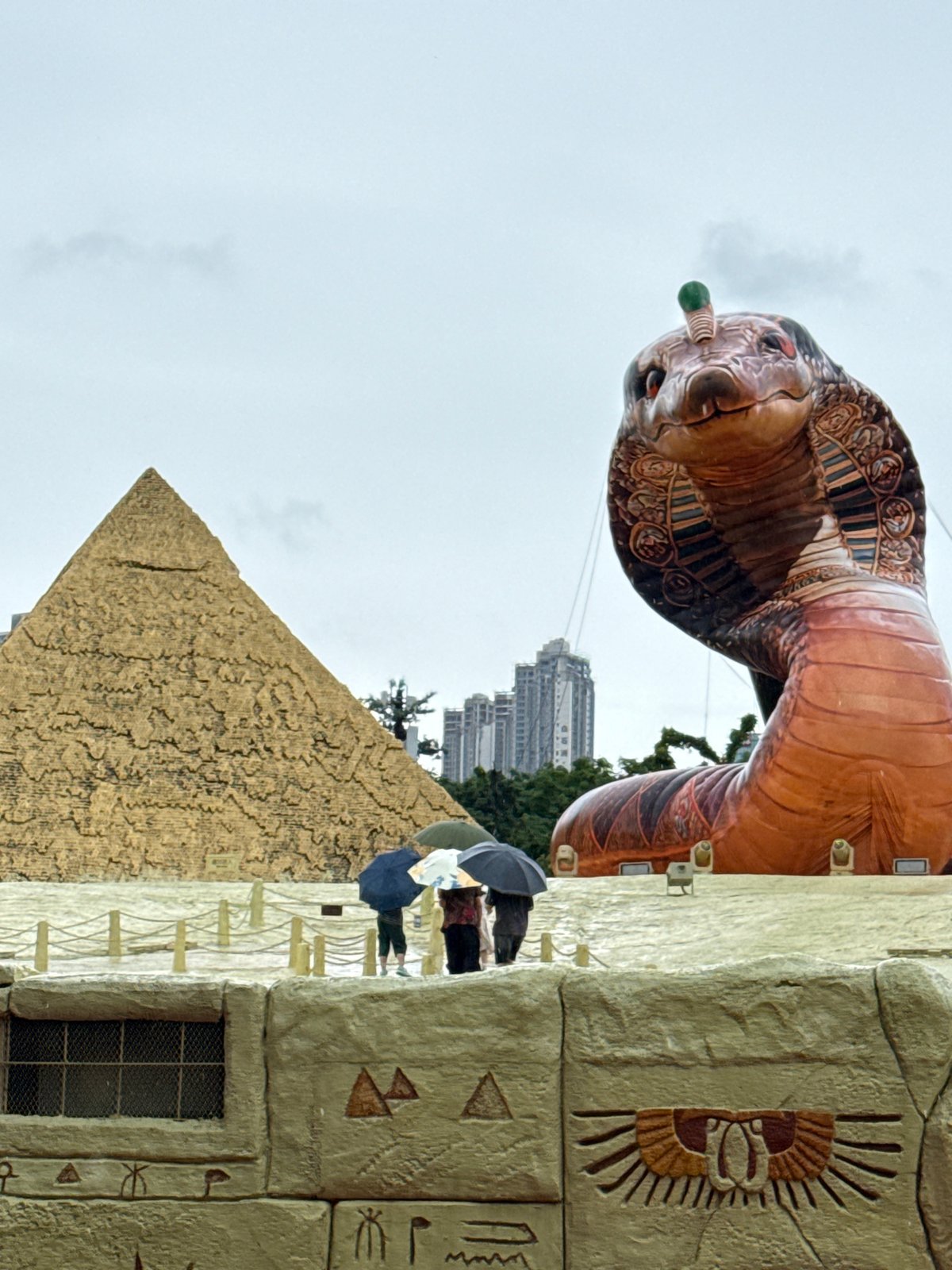 Inflatable cobra and Egyptian décor at a Nanshan themed venue