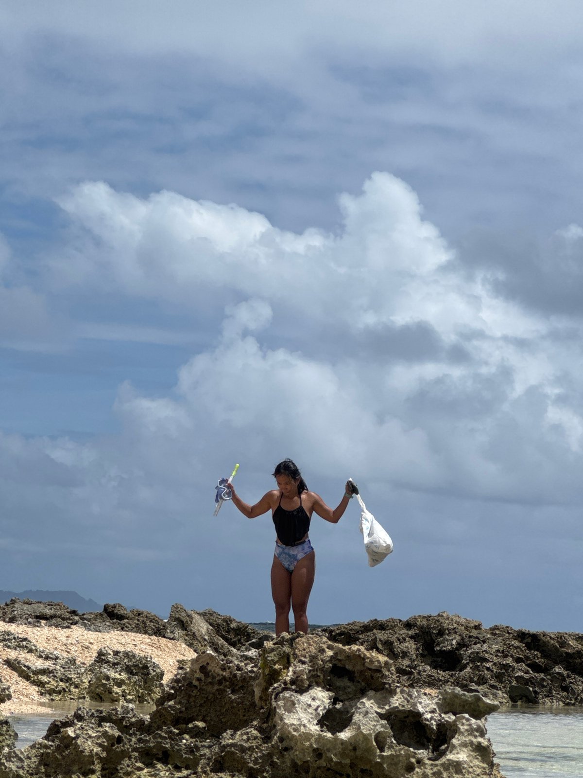 Woman enjoys beach day with snorkeling gear in General Luna