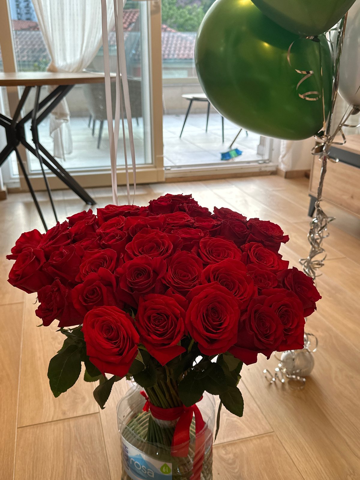 Birthday celebration with cake and roses in Montenegro village
