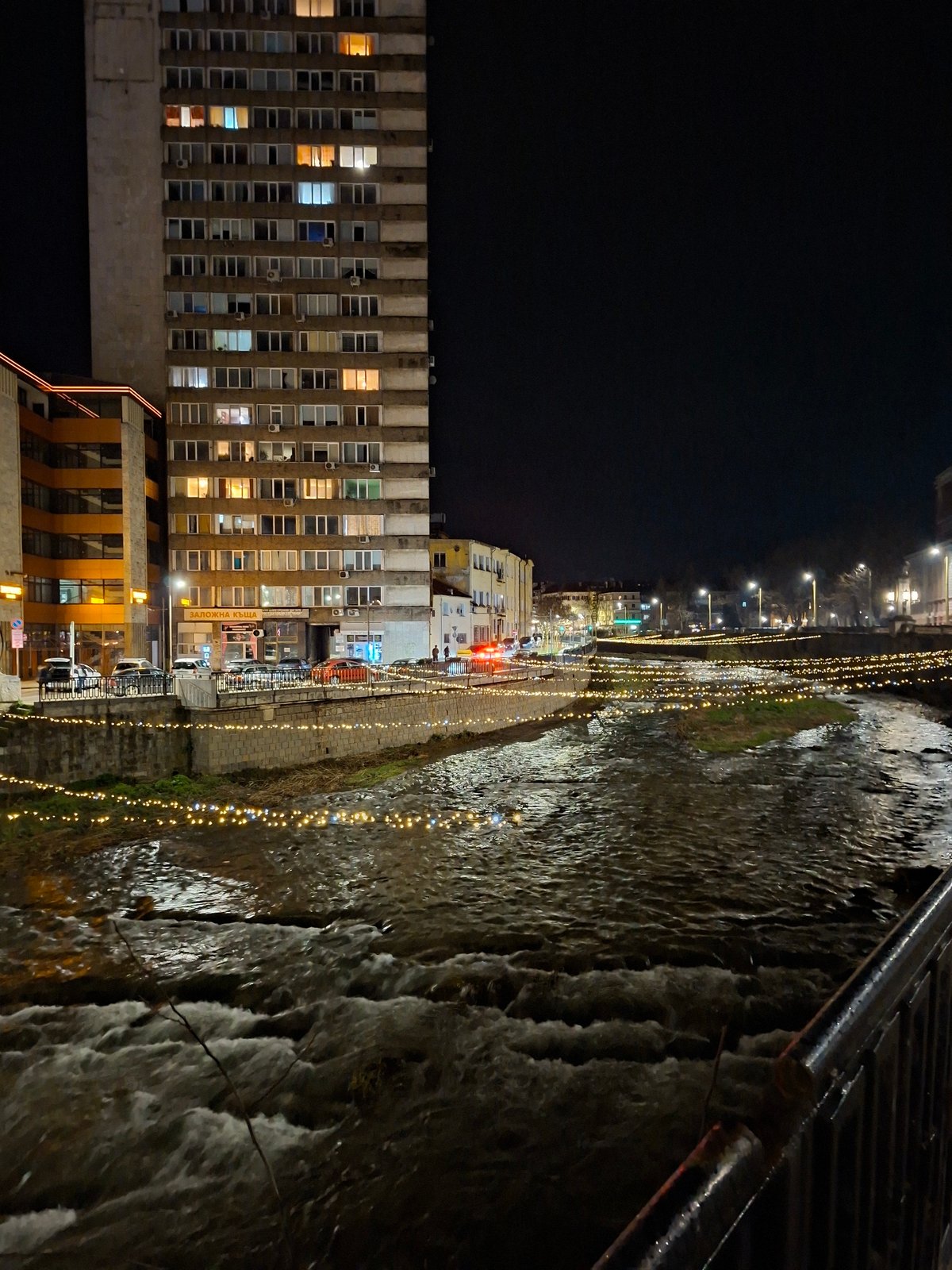 Evening documentation captures Gabrovo's lit waterfront and architectural details