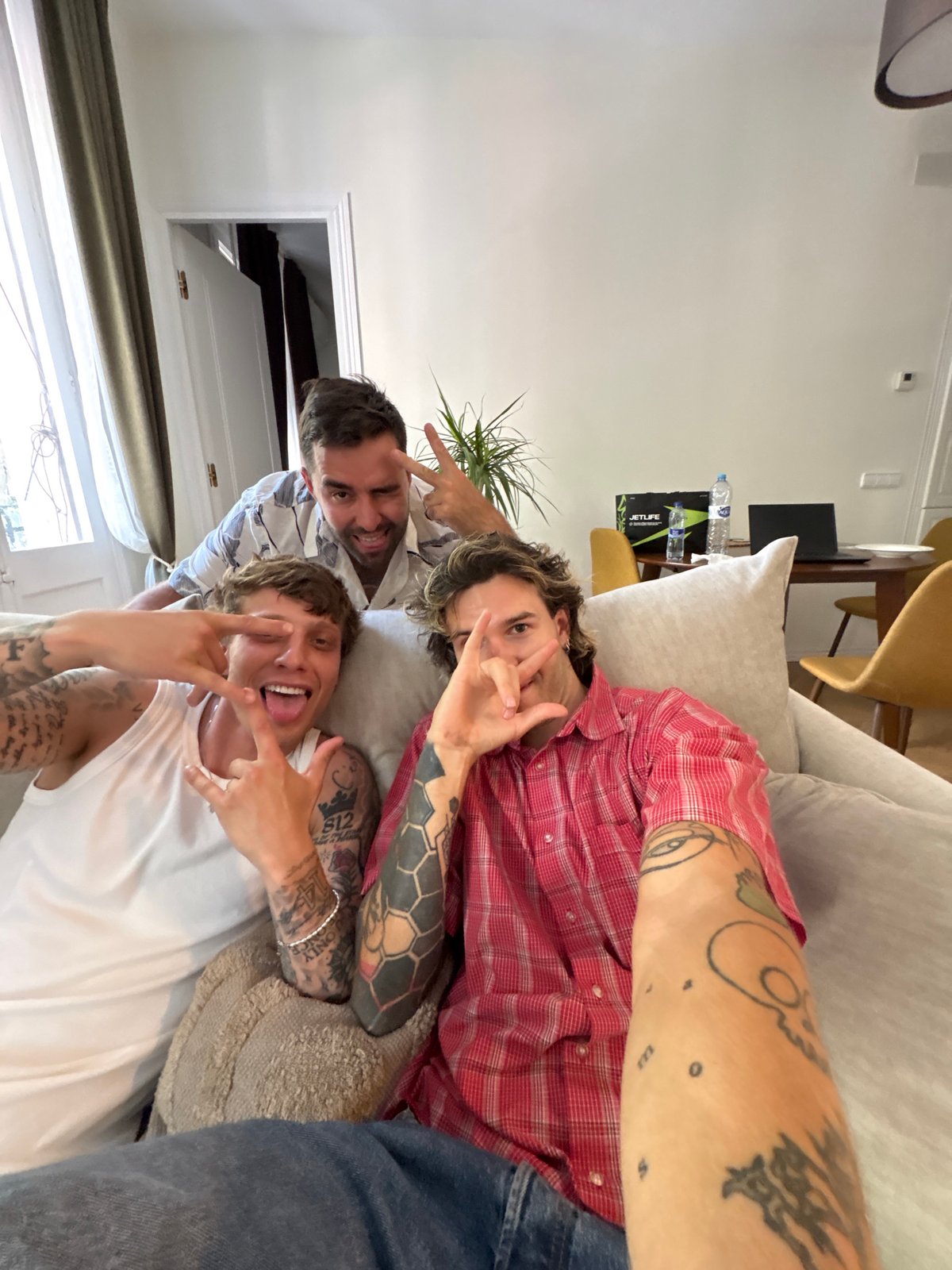 Casual living room selfie on a light couch in Barcelona