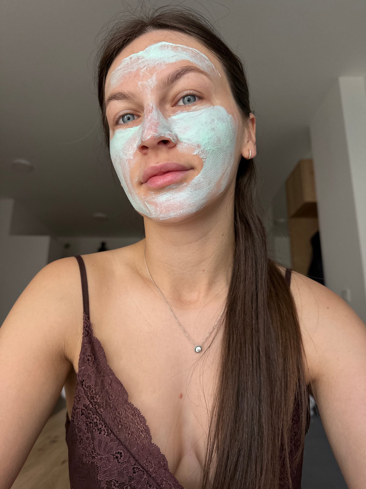 Woman documents morning beauty routine in Budva apartment
