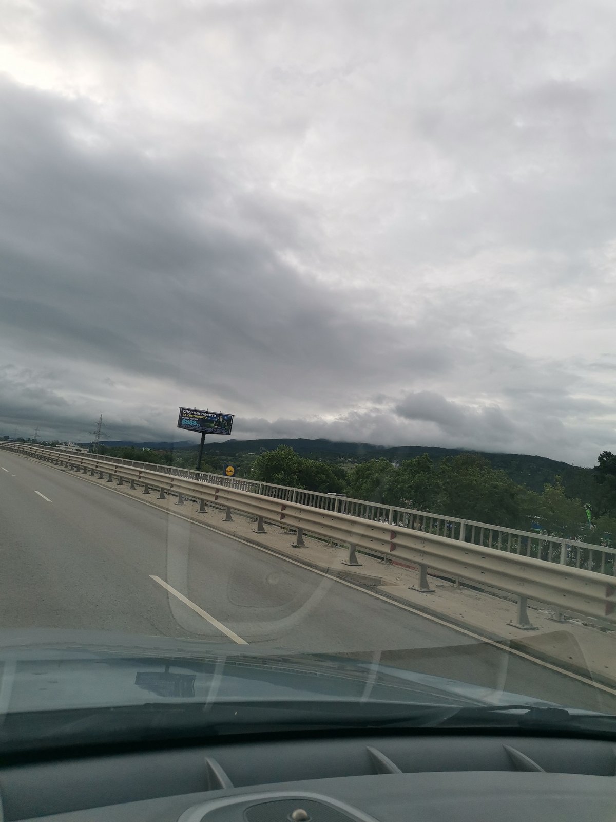 Early morning highway travel captured in Pancharevo, Bulgaria