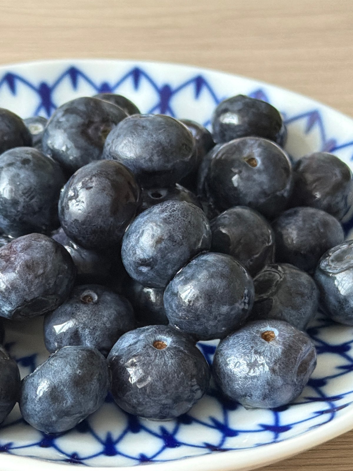 Morning tea with blueberries served on porcelain in Saint Petersburg