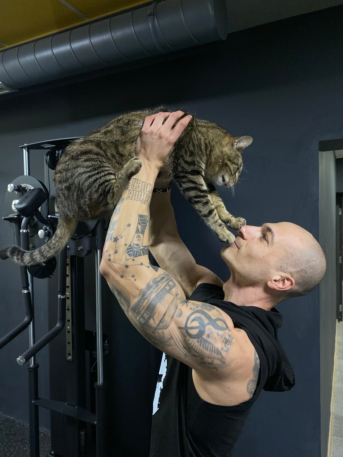 Tender cat moment and workout session captured in Pleven