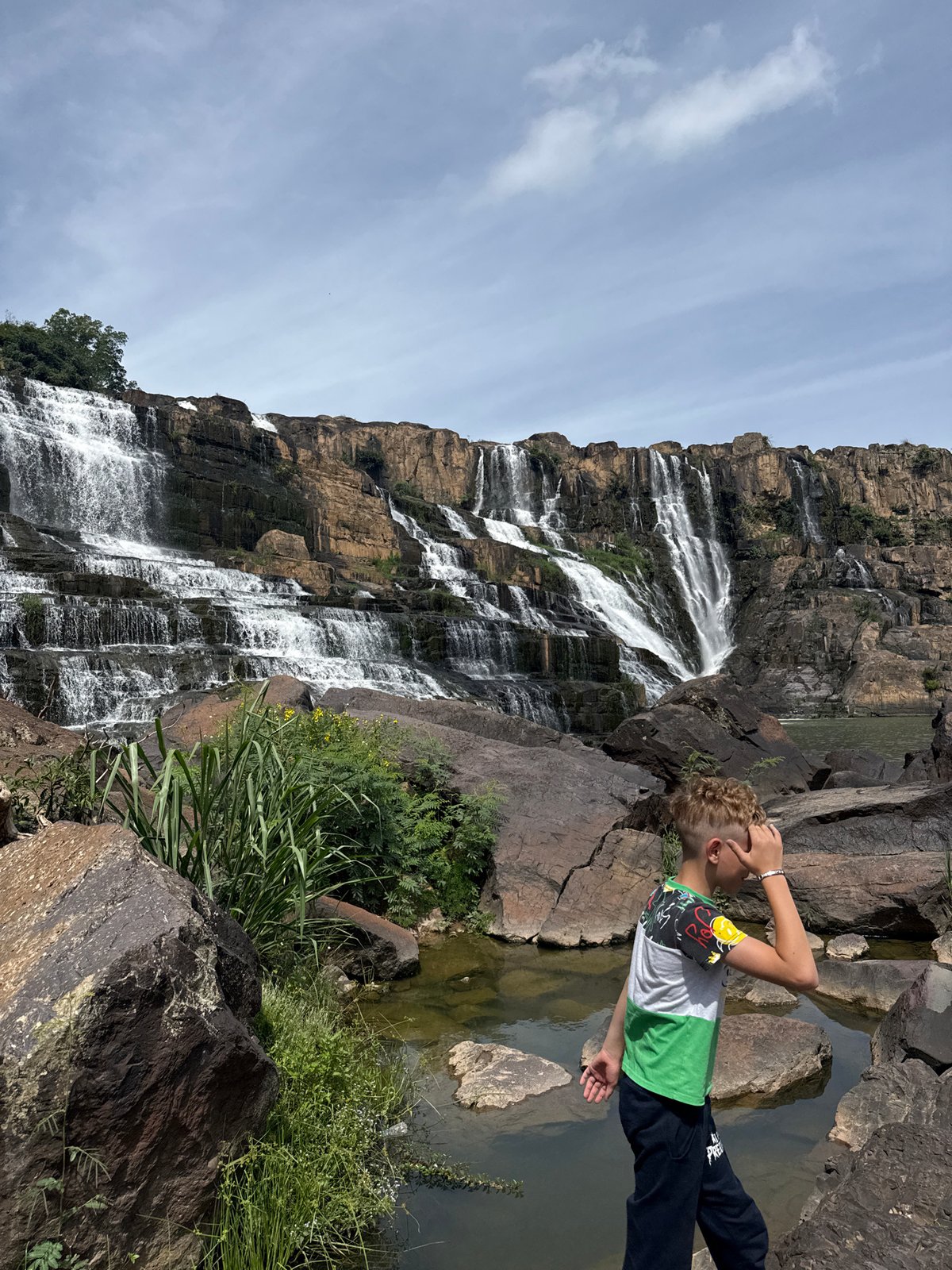 Pongour Waterfall and tropical blooms, Tân Phú, Vietnam