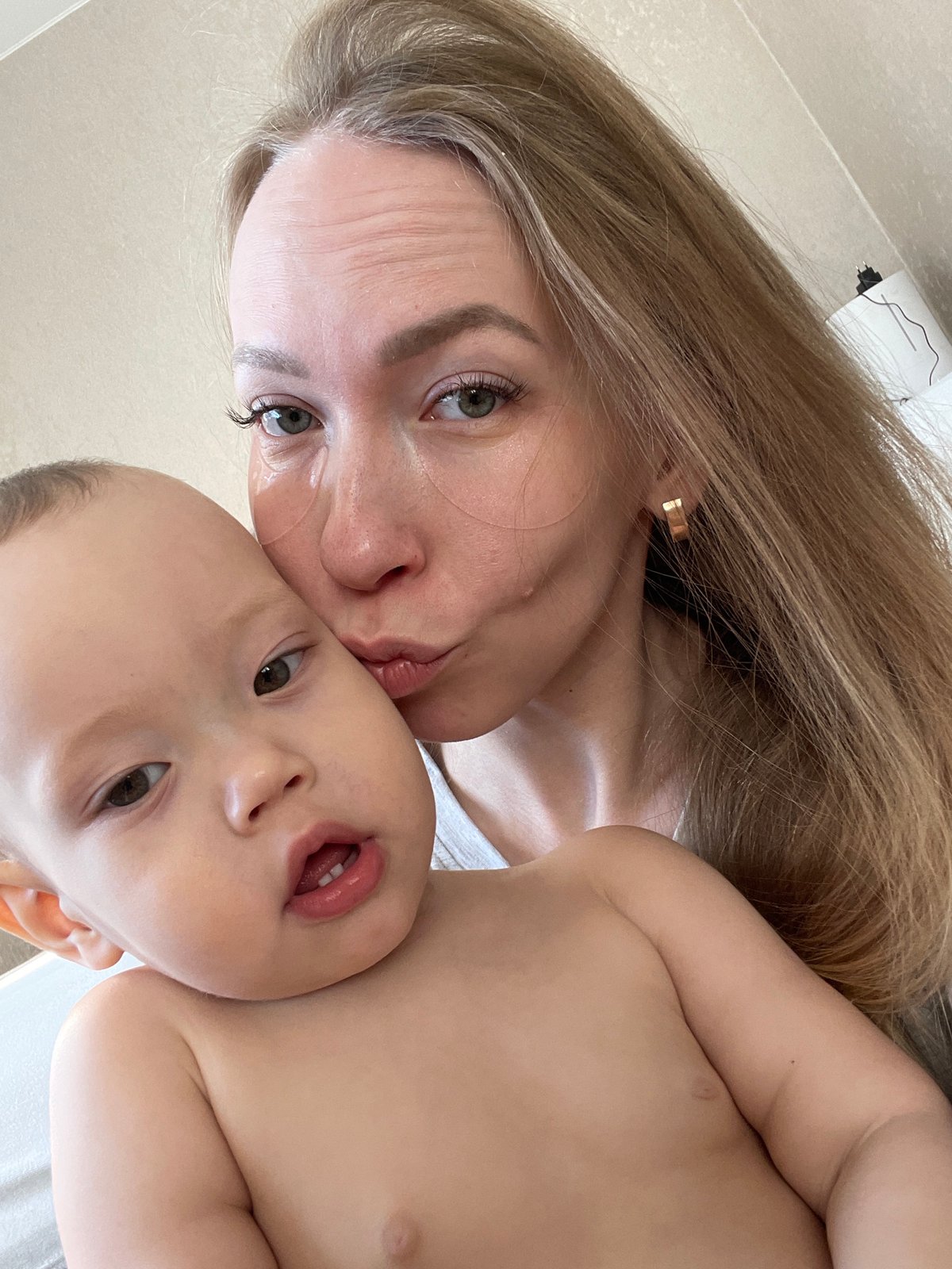 Domestic moments with woman, baby, and dog captured in Perm