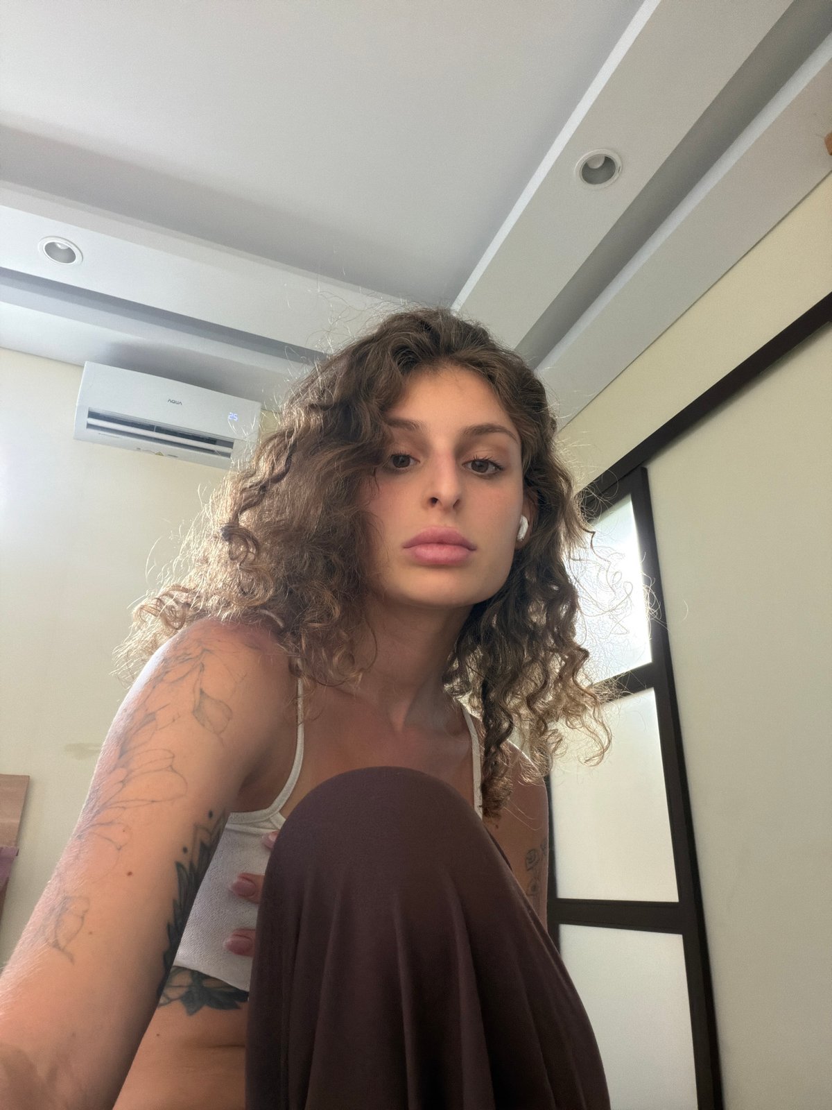 Woman takes multiple selfies in North Kuta morning routine