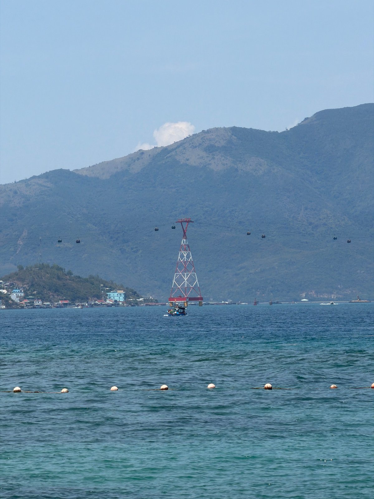 Tourist captures coastal scenes during early morning Nha Trang visit