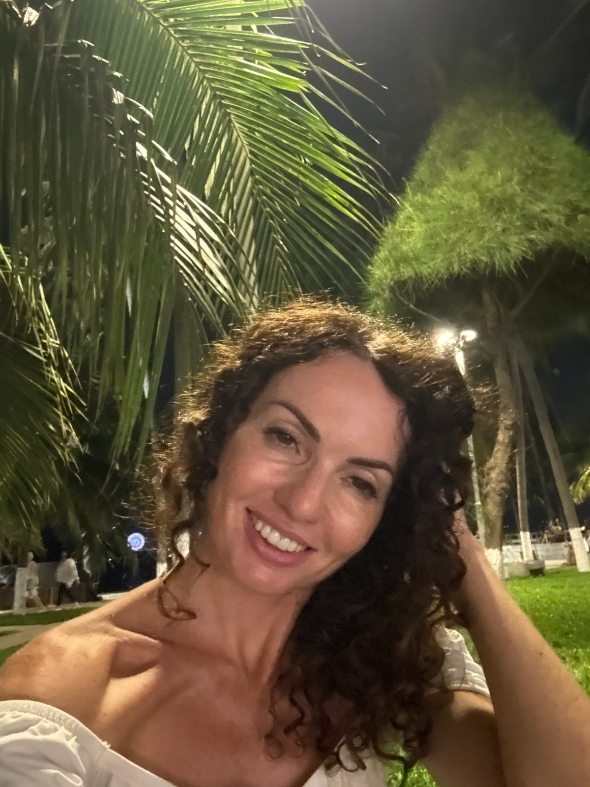Nha Trang park at night: Tai Chi, live singing, and locals hanging out