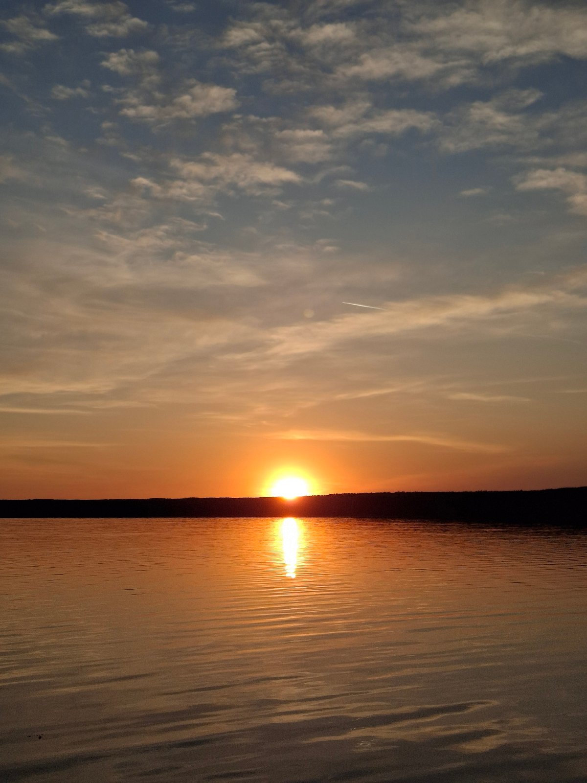 Sunset documented over waterfront in Chaikovsky, Russia