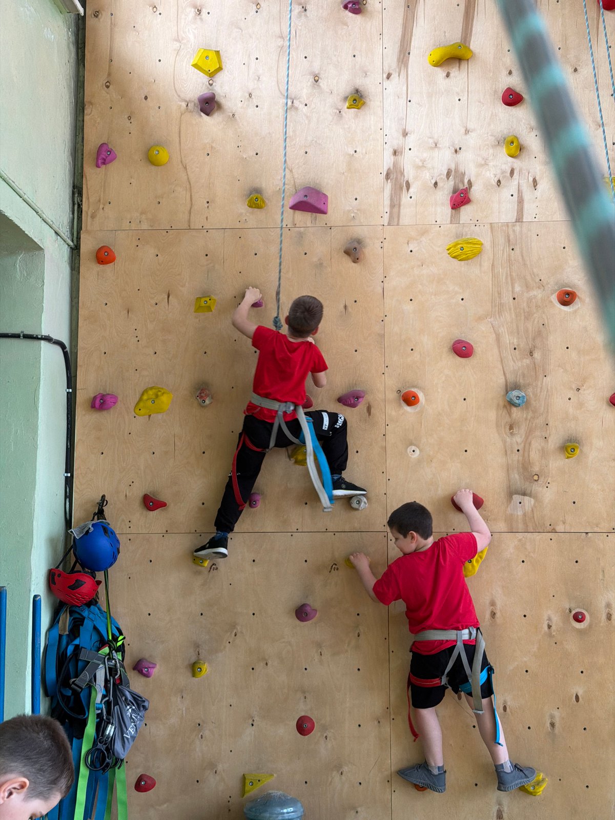 Boys practice indoor rock climbing at Izhevsk facility
