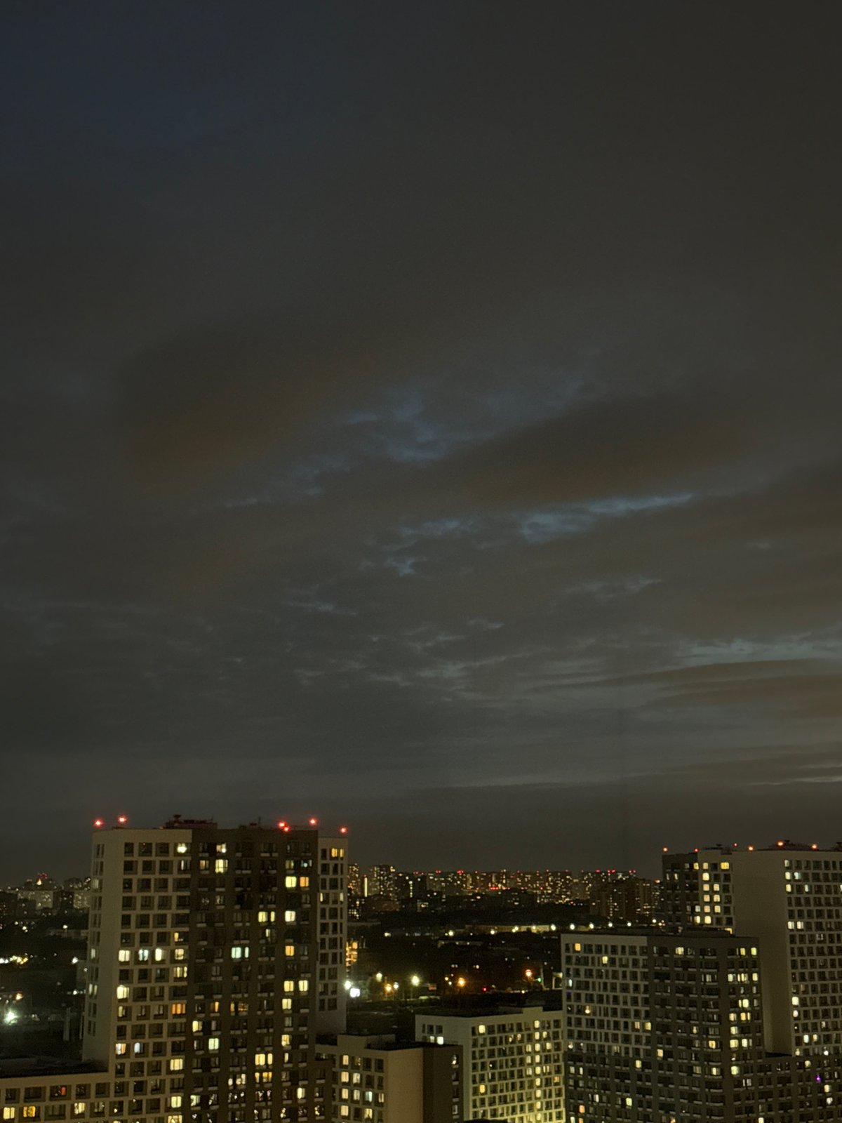 Nighttime cityscape documentation captures illuminated Lyubertsy apartment buildings