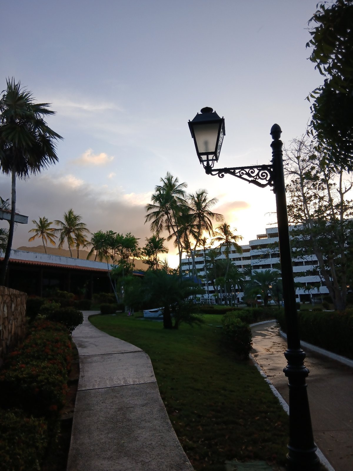 Evening documentation captures tropical resort scenes at Venezuelan beach