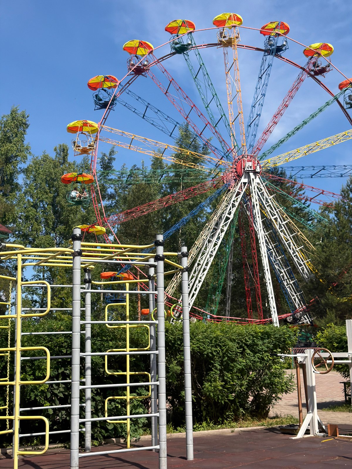 Morning scenes captured at Chaikovsky park with Ferris wheel