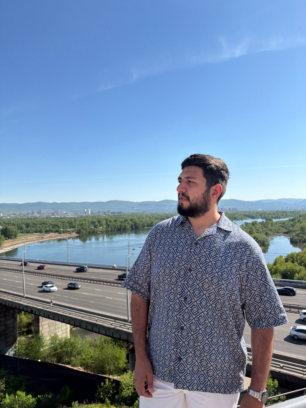 Man visits multiple Krasnoyarsk viewpoints overlooking Yenisei River