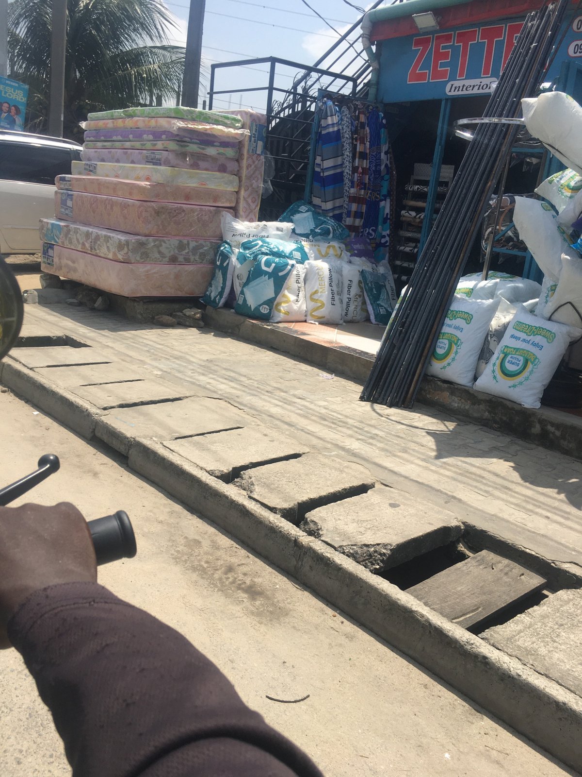 Midday street life documented across Ado, Nigeria commercial district