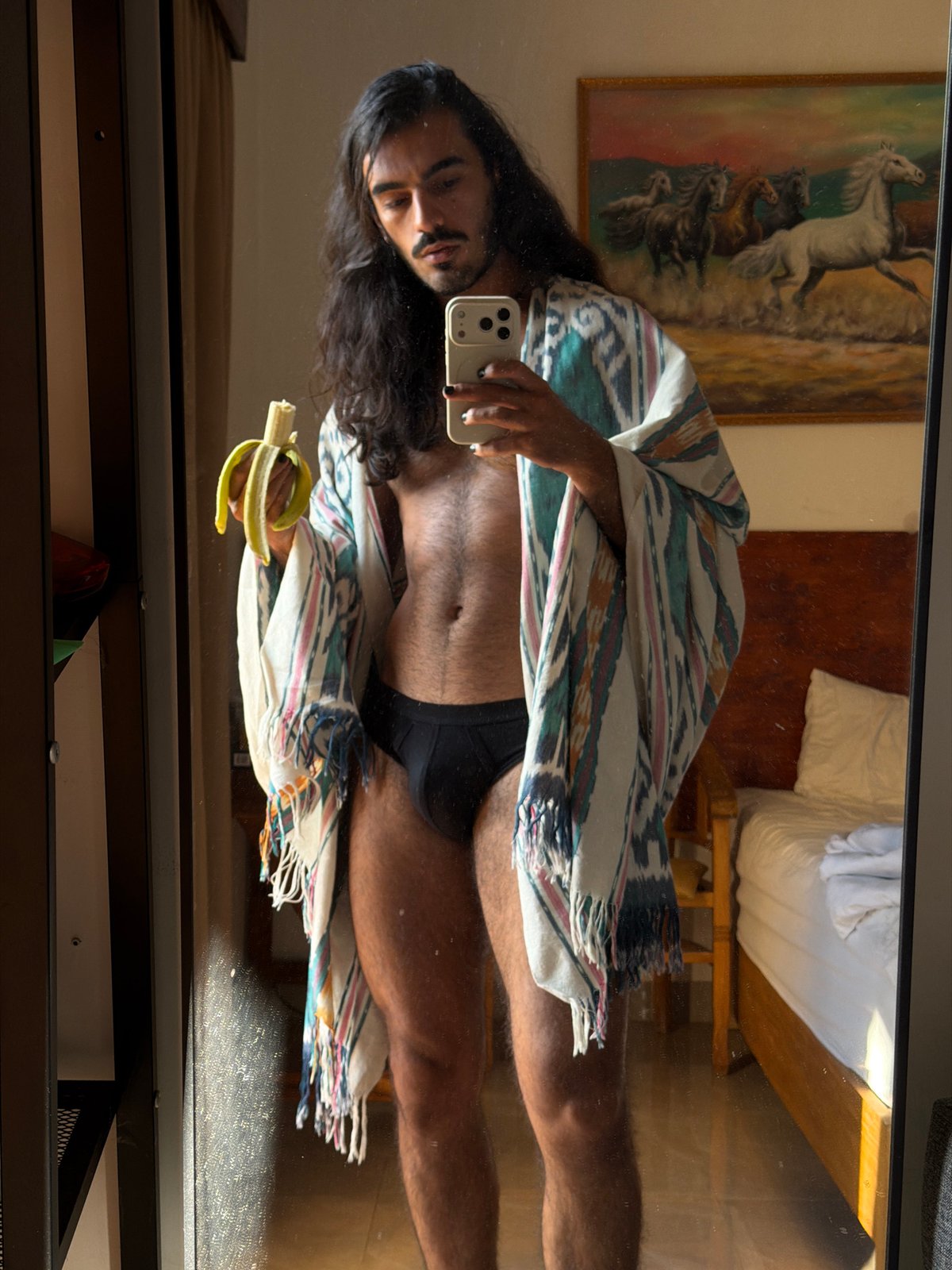 Man Takes Mirror Selfies in North Kuta Indonesia