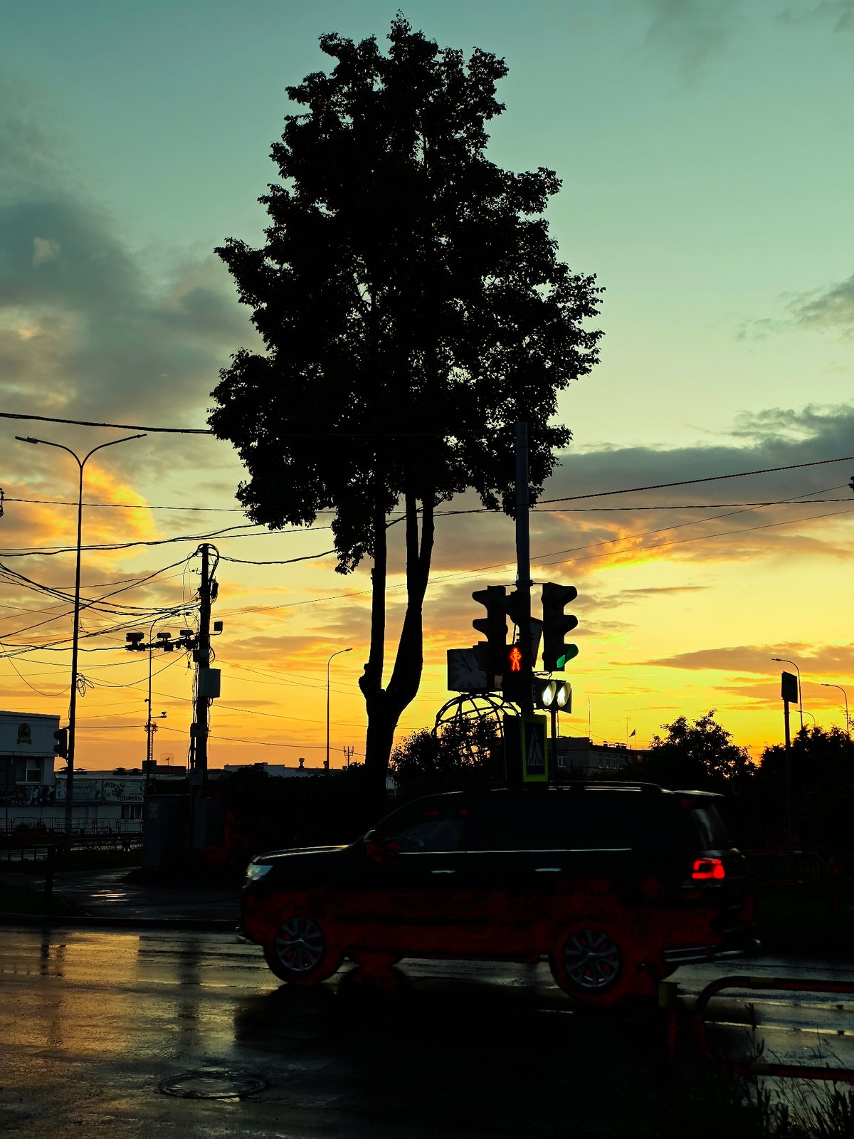 Evening street life documented in Chaikovsky during Russia Day