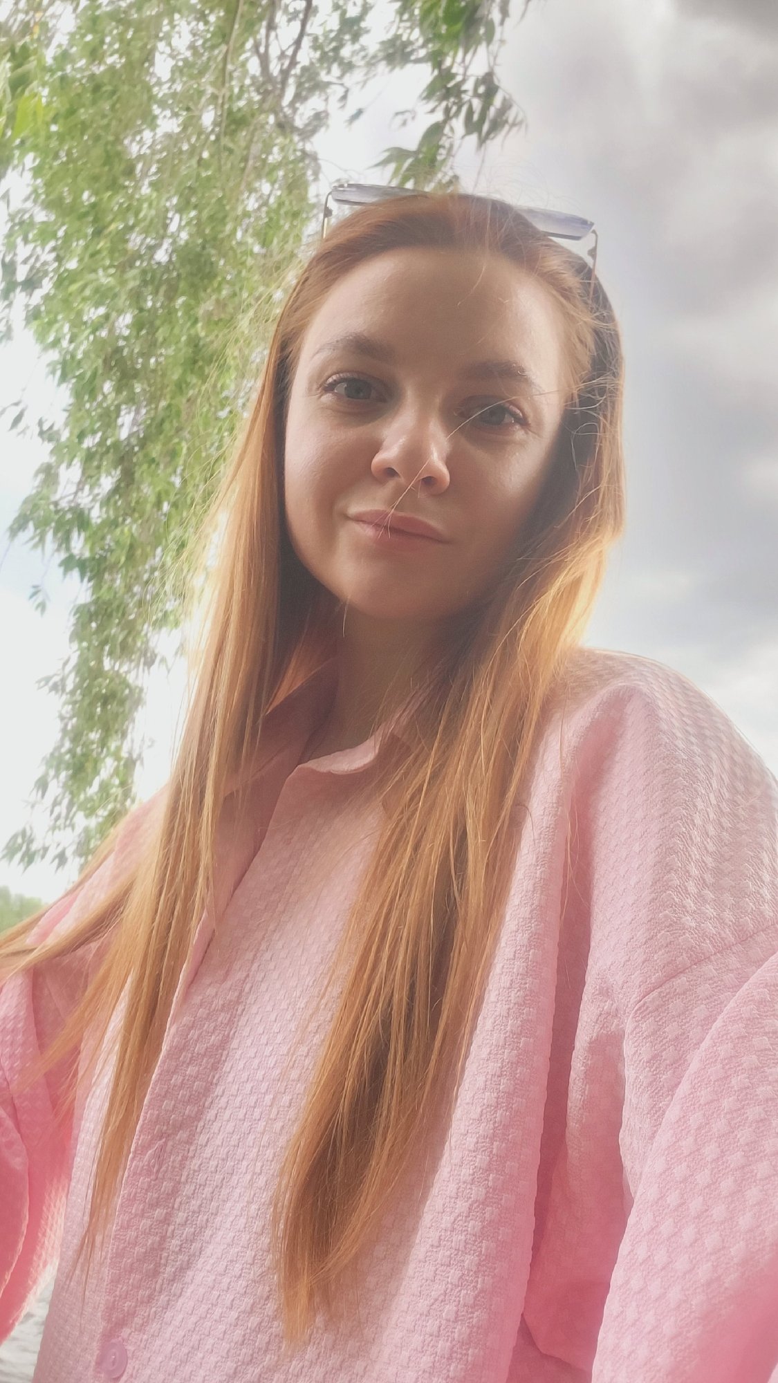 Woman documents riverside outing in Chaikovsky, Russia