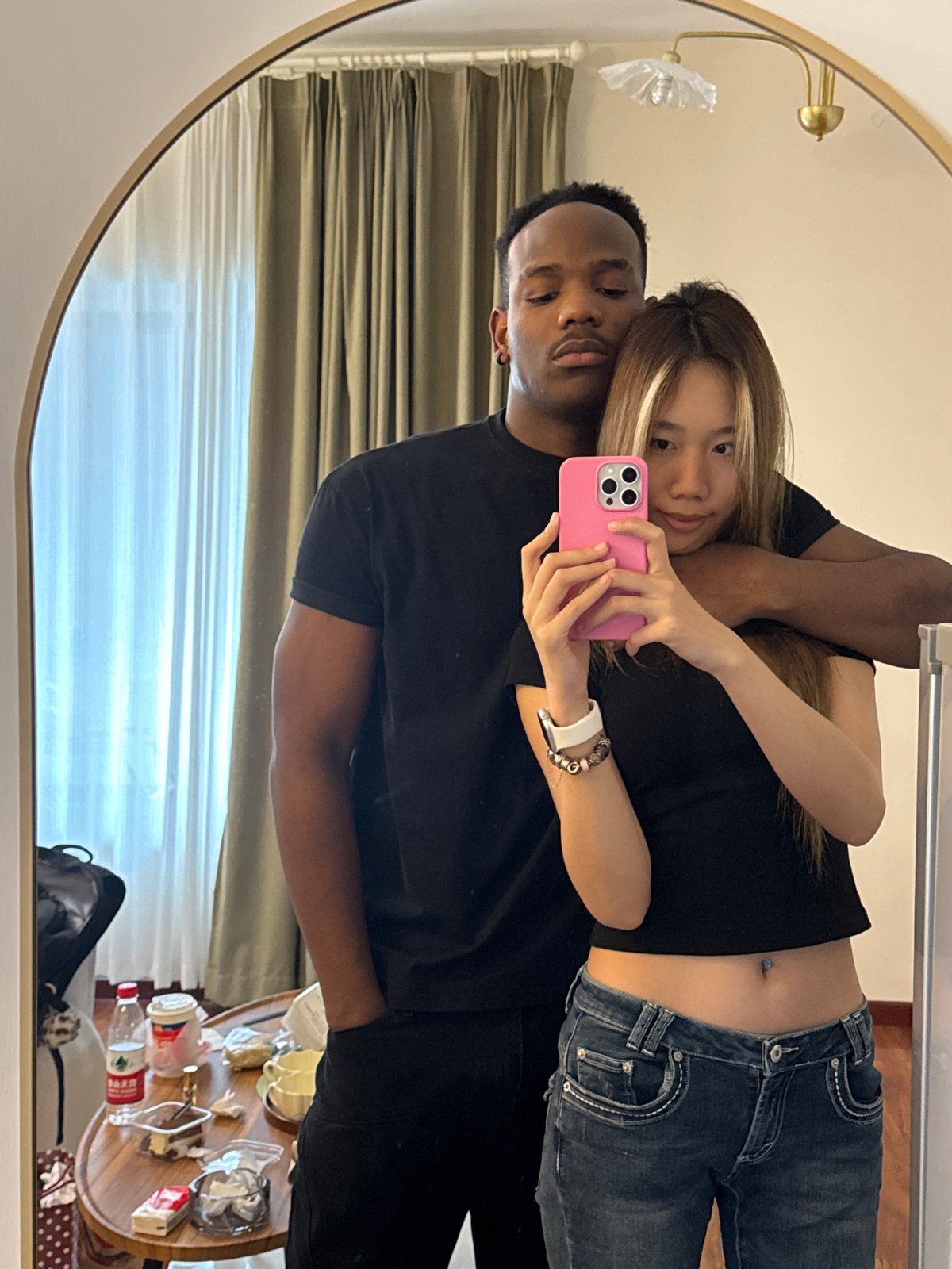 Couple Takes Mirror Selfies in Yuzhong District Room