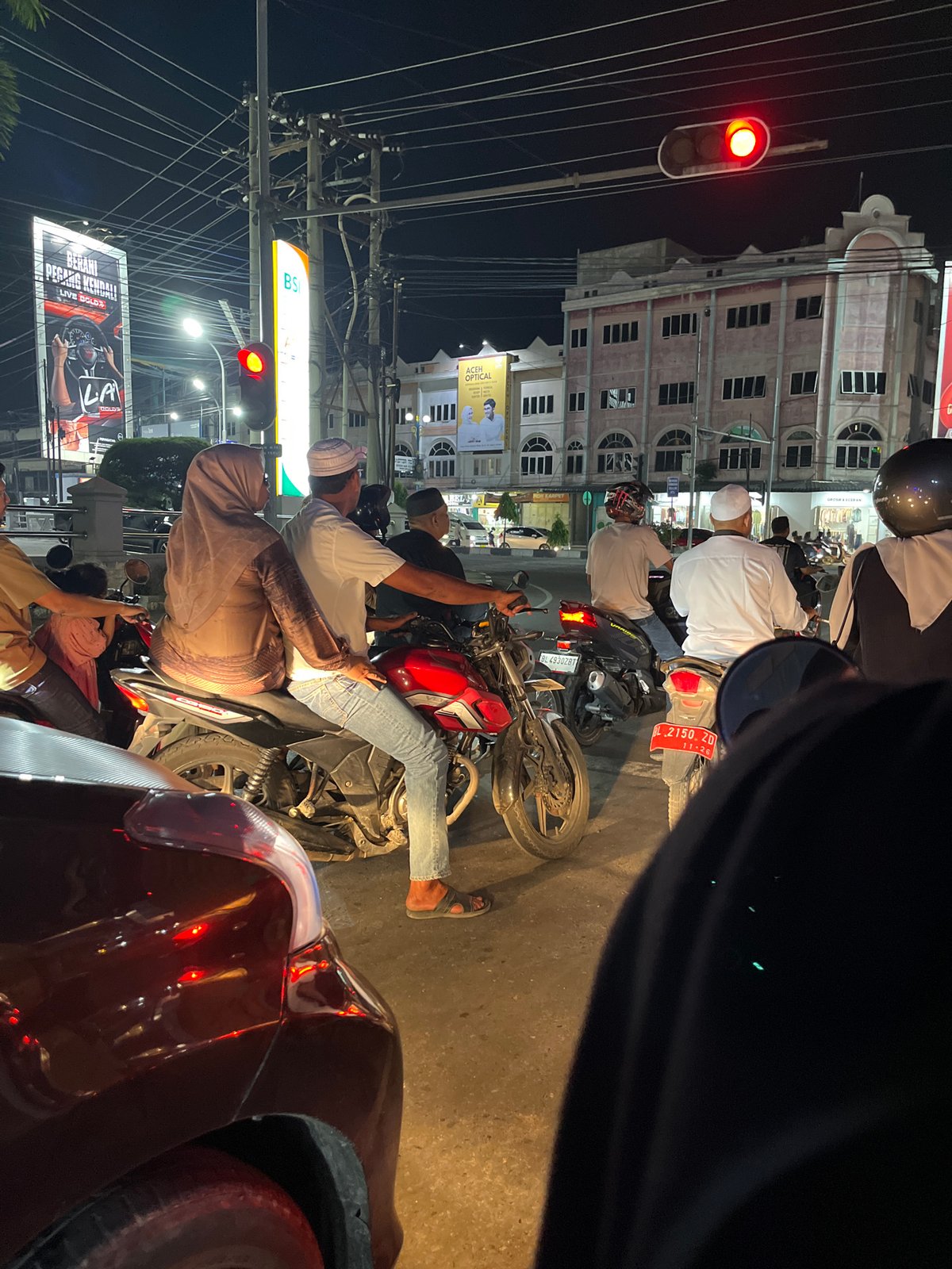 Nighttime urban scenes captured around Bank Aceh area