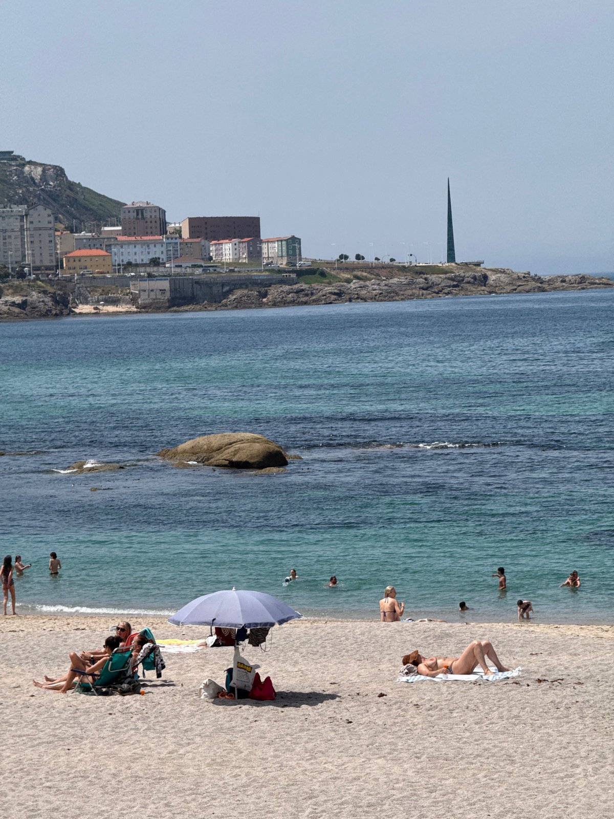 A summer afternoon drifting between Riazor Beach and a café