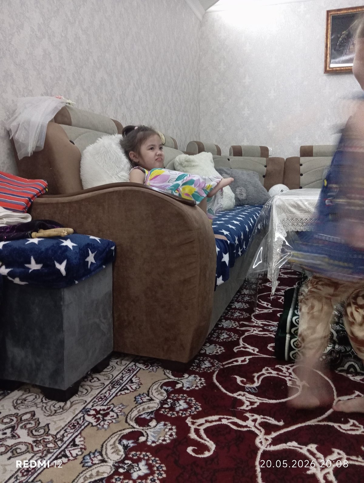 Children play and dance at home in Bekabad, Uzbekistan