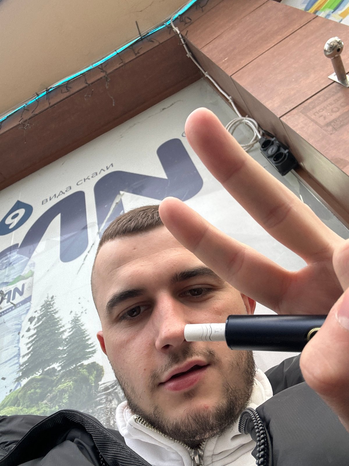 Outdoor cafe gathering documented in Plovdiv with vaping activity