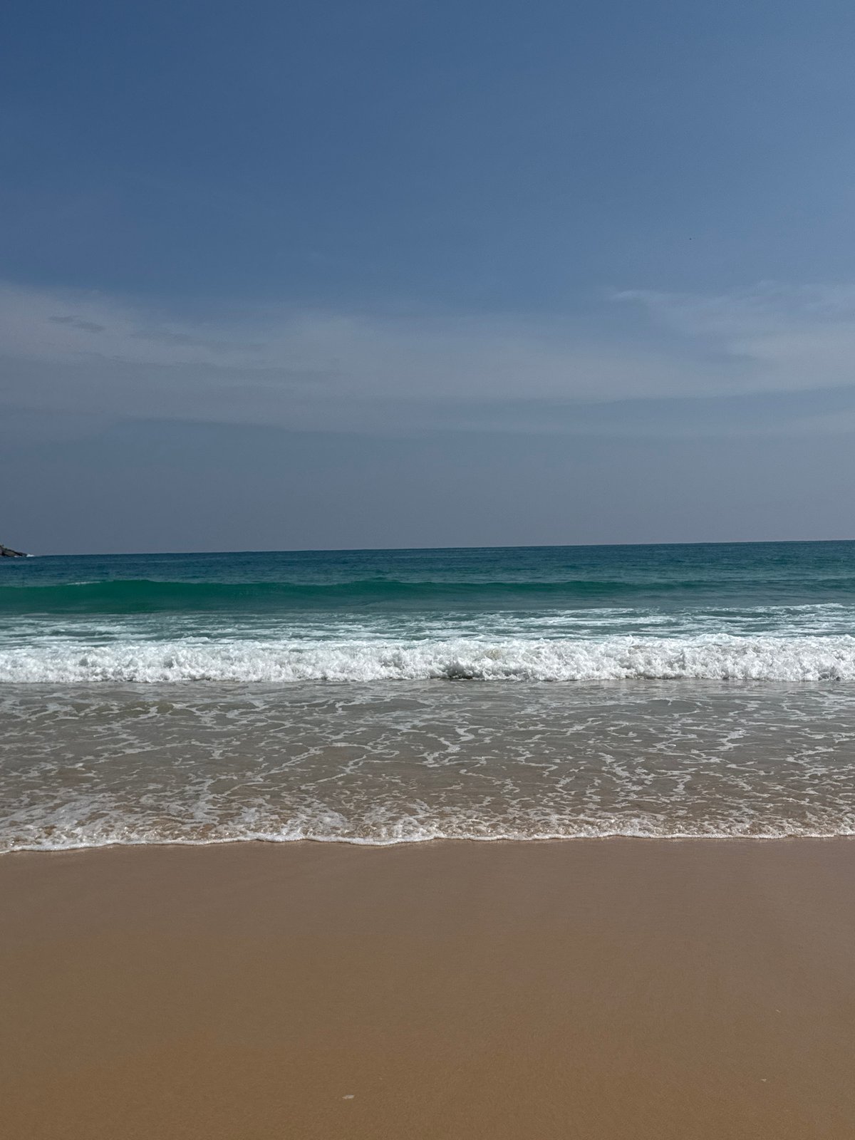 Rawai Beach on a calm July morning in Phuket