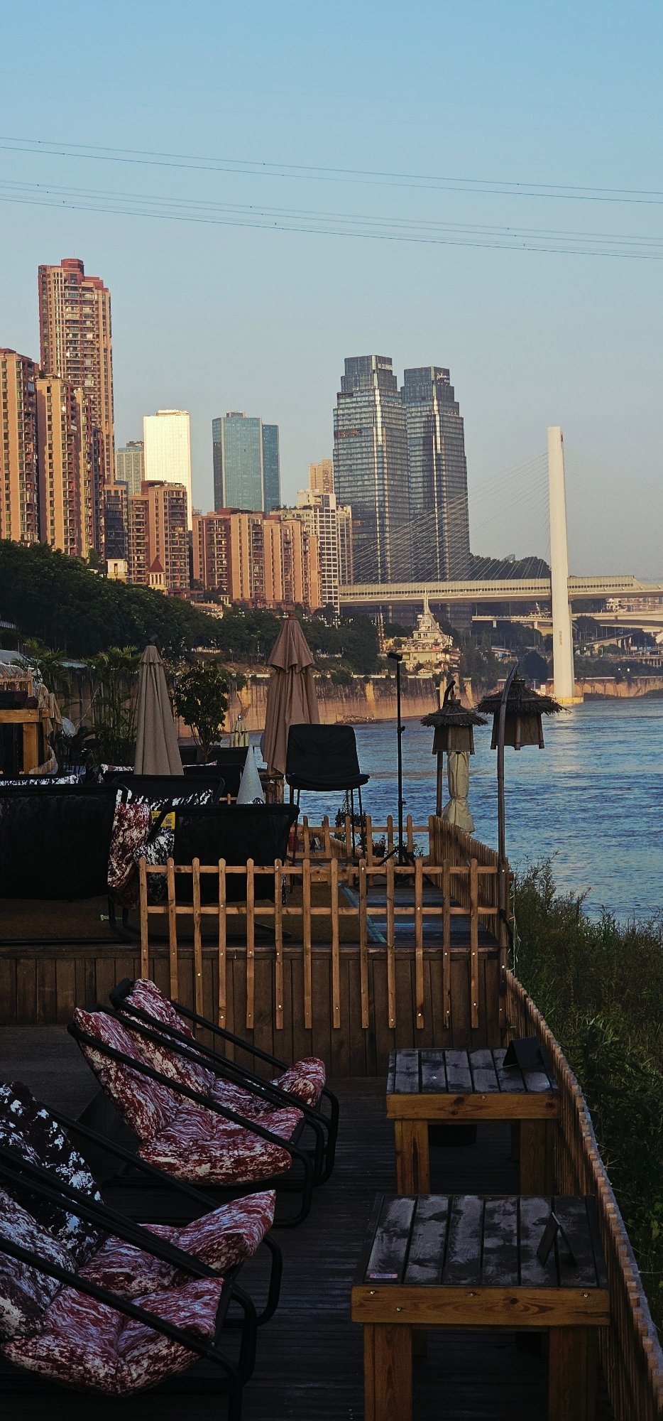 Chongqing skyline at dusk from a Nan'an riverside terrace