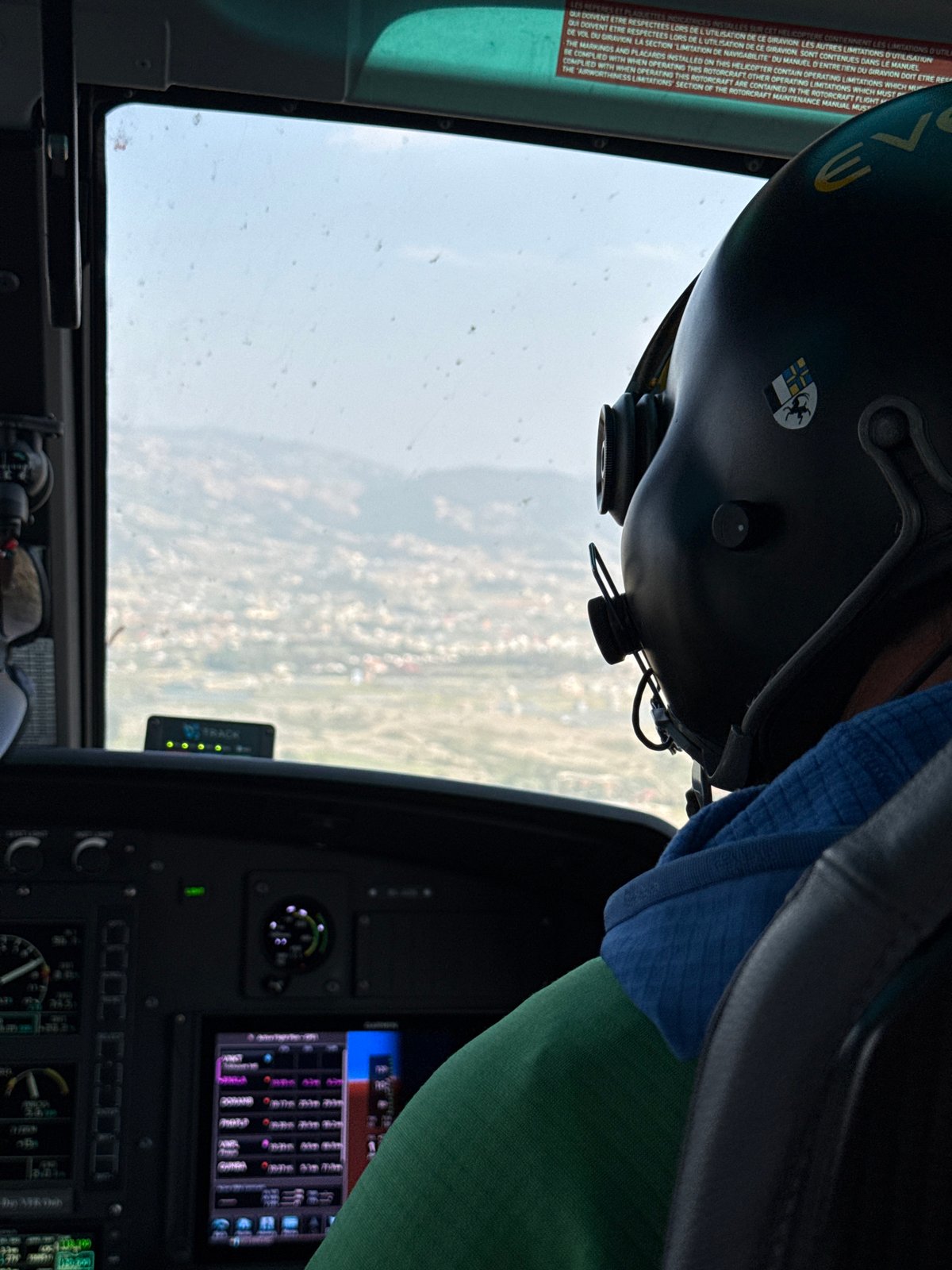 Helicopter flight documented over Changunarayan, Nepal from cockpit view