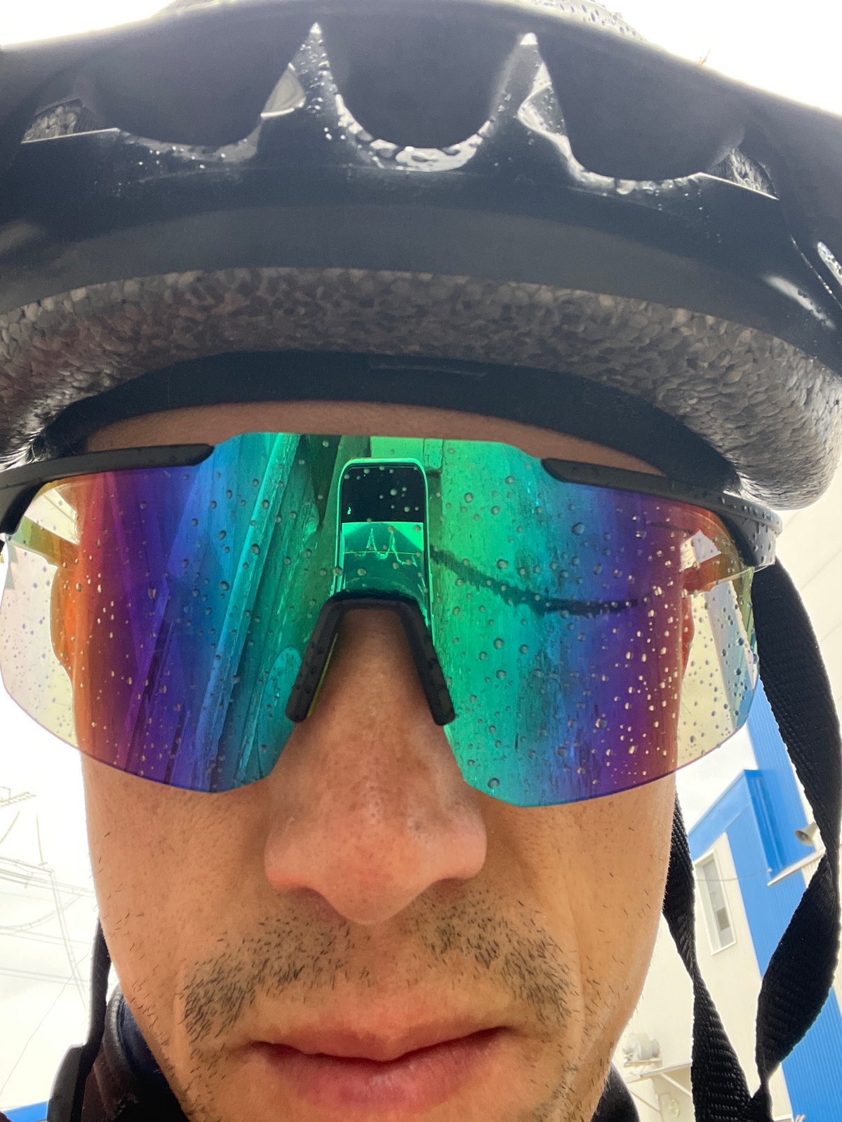 Cyclist pauses for upward glance in Chaikovsky, Russia