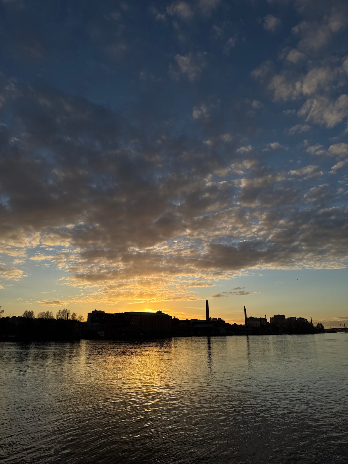 Golden hour sky patterns observed over Saint Petersburg waterfront
