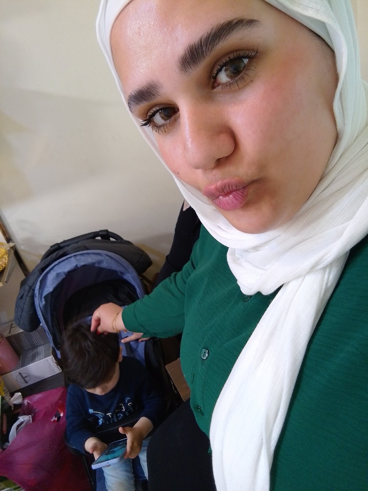 Mother documents family moments and shopping in Damascus suburb