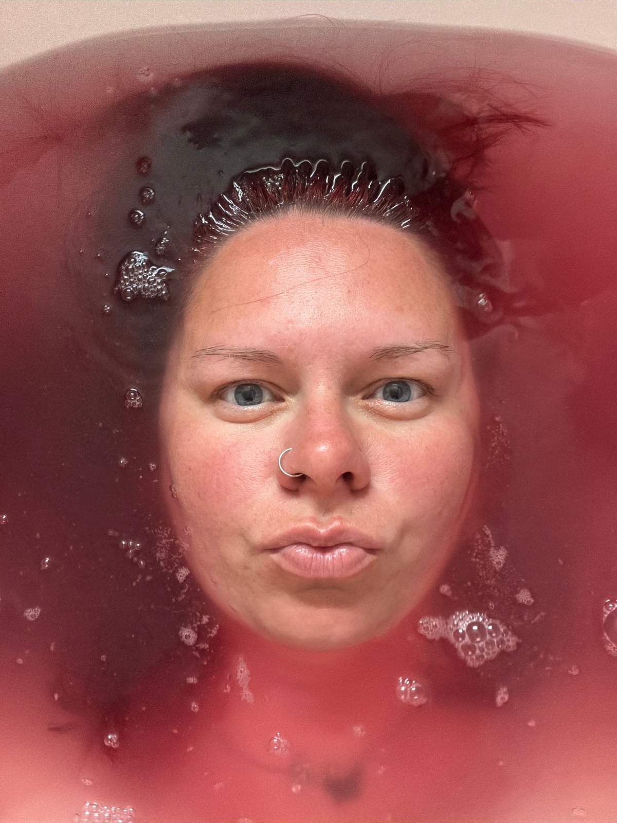 Person Takes Colorful Bath in Chaikovsky, Russia