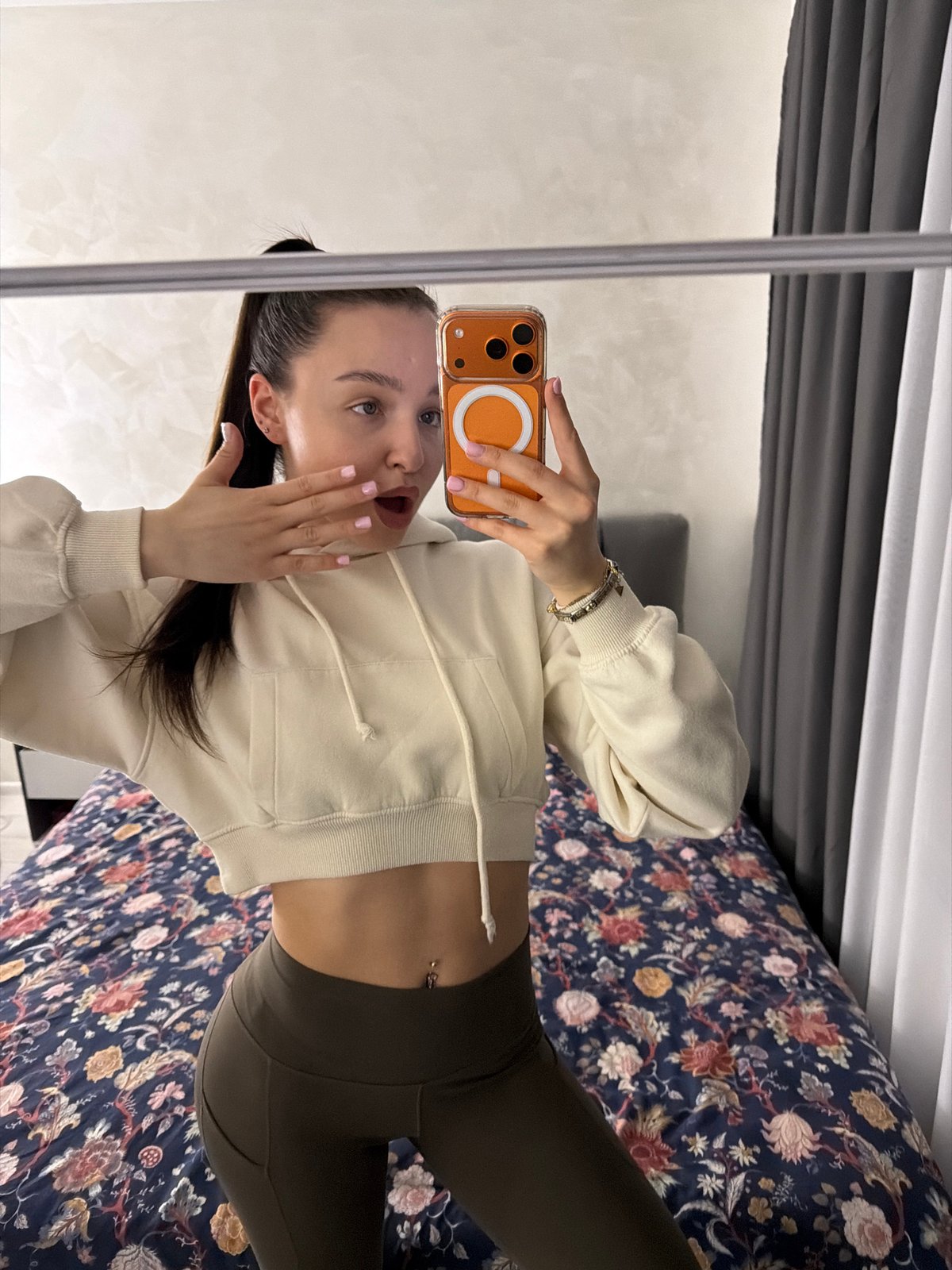 Woman documents evening routine with mirror selfies in Pernik bedroom