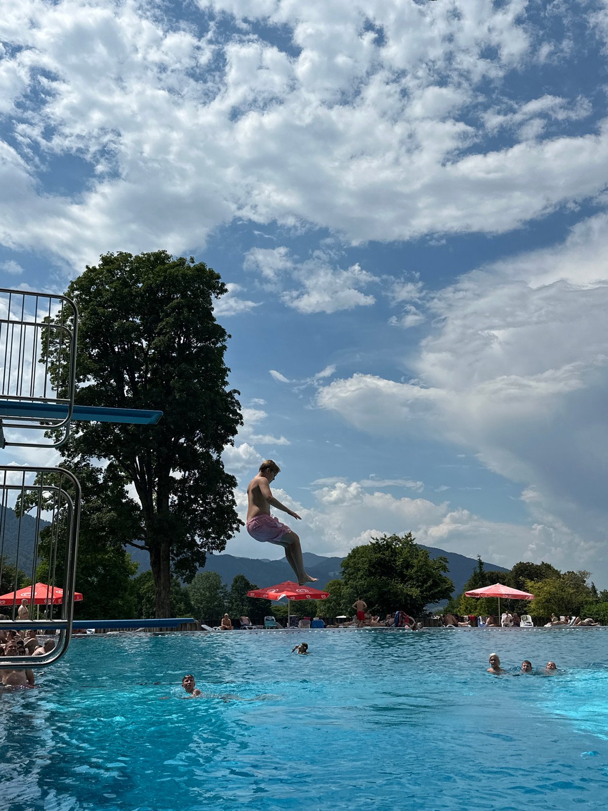 Sunny afternoon at Oberammergau's outdoor pool, dives and all.