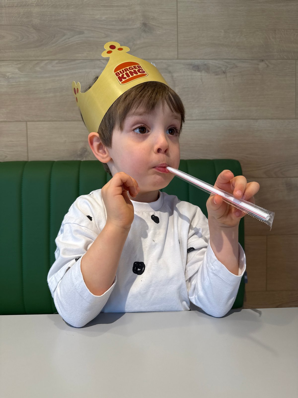 Boy in Burger King crown photographed at Montenegro restaurant