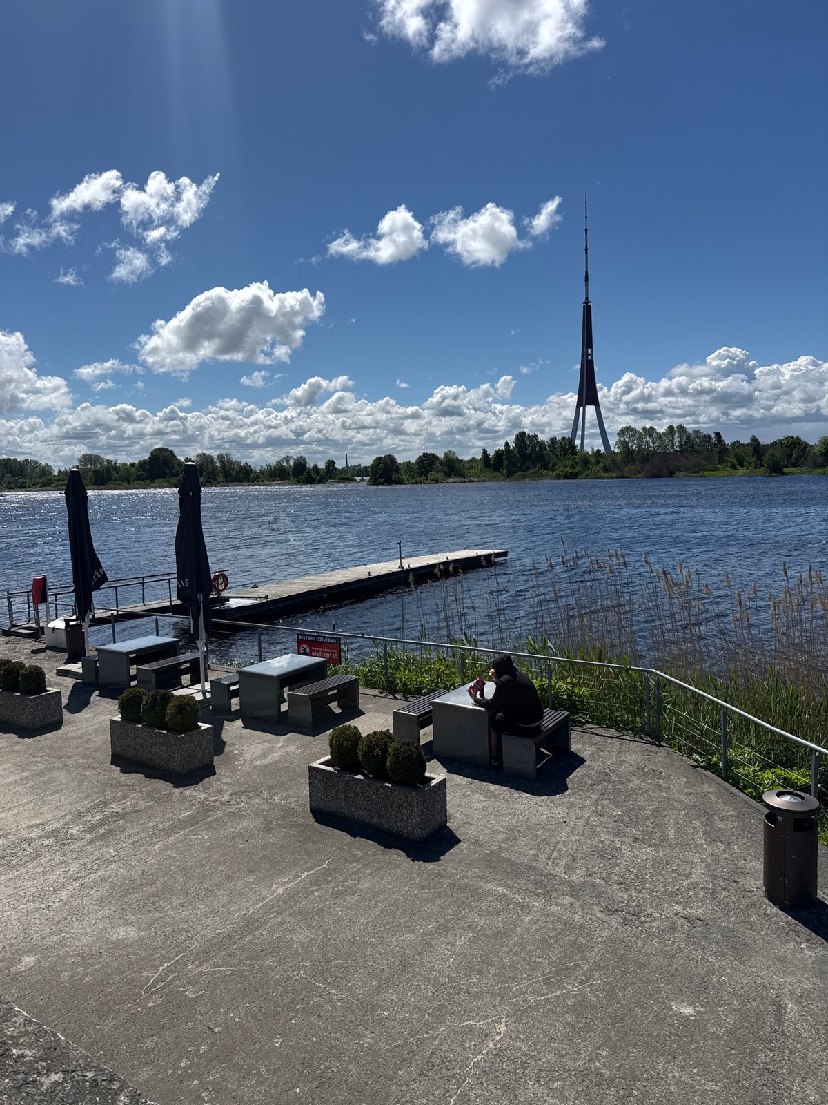 Morning waterfront scenes captured along Daugava River in Riga