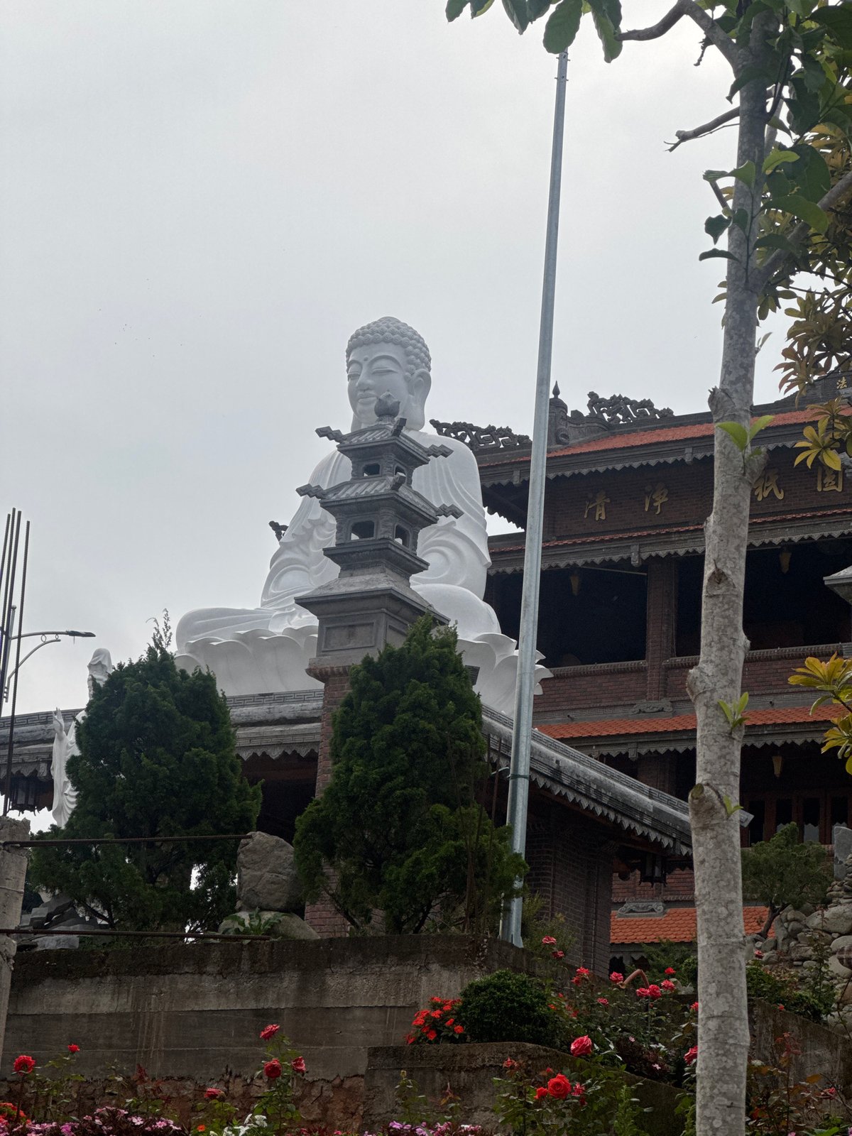 Tourist documents Buddhist temples, gardens in Da Lat Vietnam